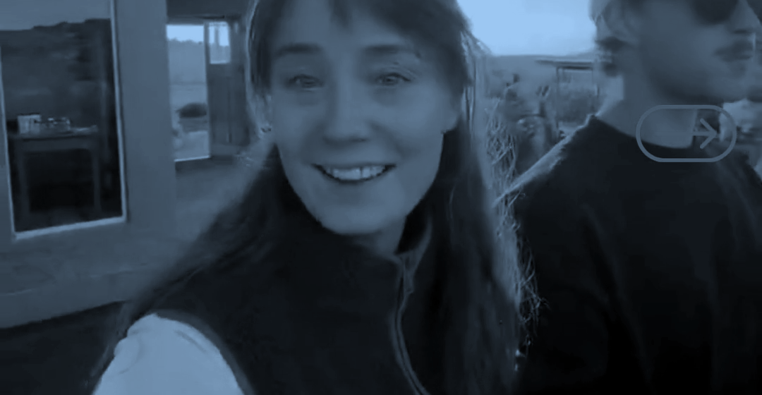 A woman's face the second she reads the news, caught on her own camera.